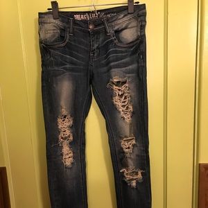 Machine brand distressed jeans